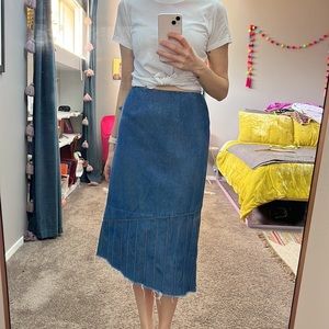 Vintage denim midi skirt with asymmetrical raw hem. Women’s size small